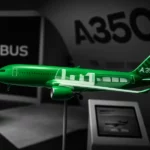 A model of an Airbus A350F aircraft displayed in an exhibition setting.