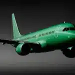 An airplane in flight against a clear sky.