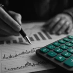 Financial analysis with charts and a calculator.