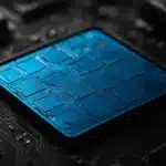 A detailed image of a microchip on a circuit board.