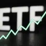 Neon ETF sign with upward trend line.