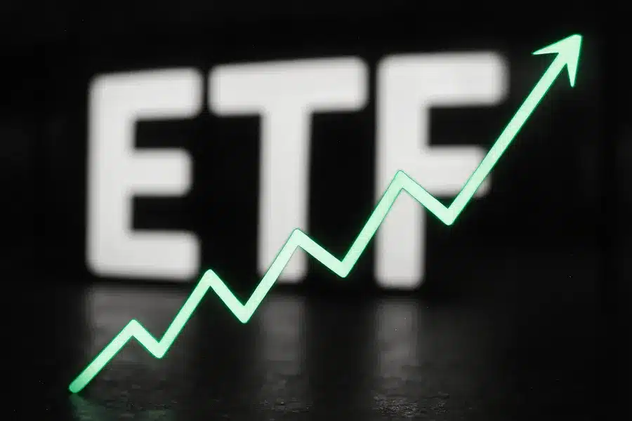Neon ETF sign with upward trend line.