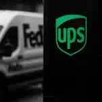 FedEx and UPS delivery vans in an urban setting.