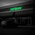 Verizon store facade with parked cars