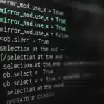 Close-up of computer code and digital data interface.