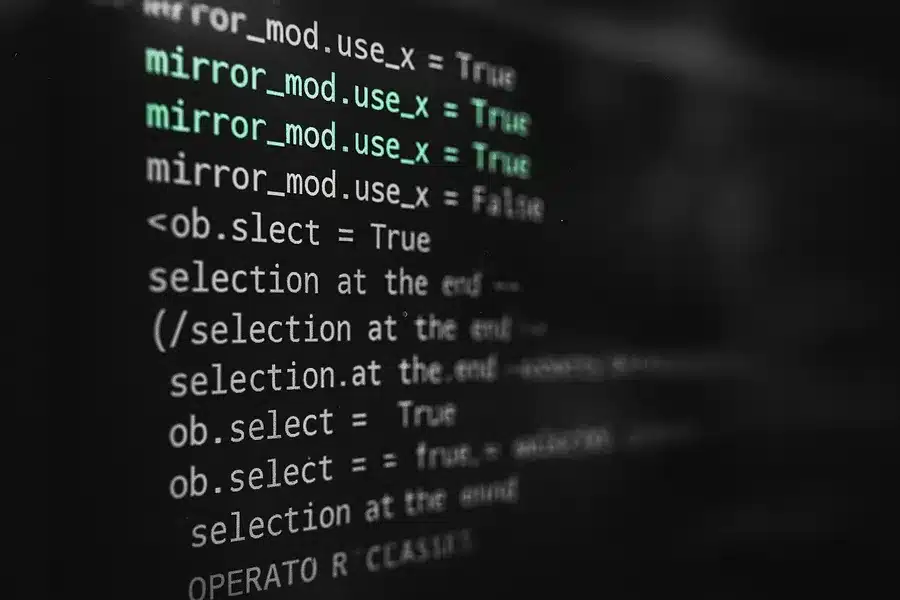 Close-up of computer code and digital data interface.