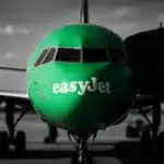 An airplane parked at an airport gate.