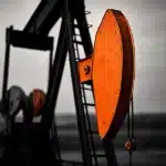 Oil pumpjack in an open field