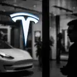 Tesla showroom with a visible car and brand logo